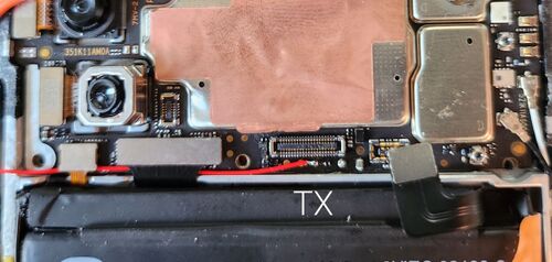 TX is easily accessible, red wire on photo. RX is under a metal shield on the other side of the board.