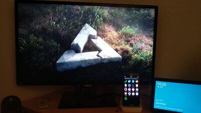 Samsung Galaxy S III providing video out to a TV through an original Samsung dock (model name: EDD-S20EWE).