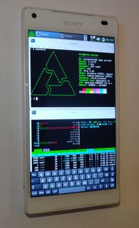 Sony Xperia Z5 Compact with neofetch and htop in two terminals (Xfce4)