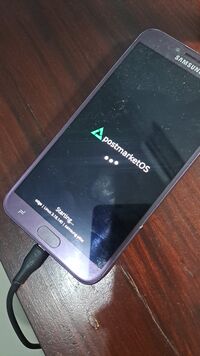 Samsung Galaxy J4, on postmarketOS boot splash screen